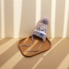 A grey woolen cap with a fluffy bear pattern, a warm knitted winter hat for girls Application Scenario